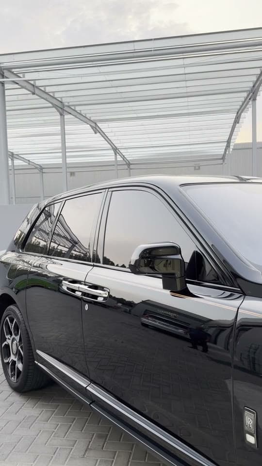 Ceramic window tint film being installed on a luxury car by ASV Phantom