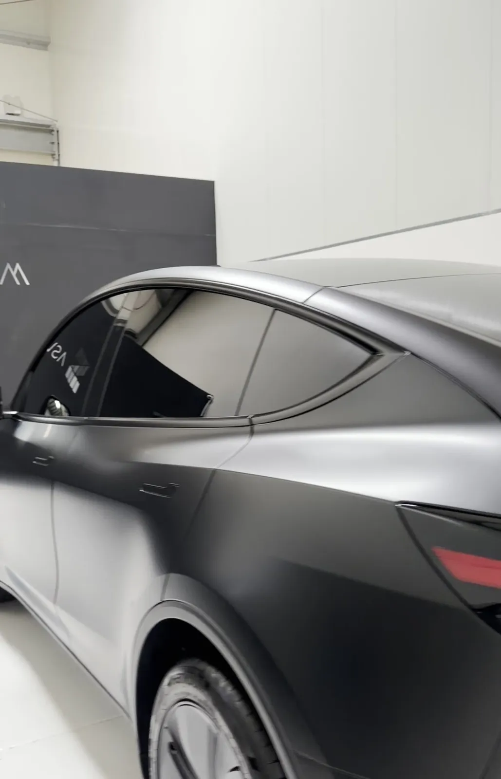 Close-up of matte PPF texture on a Tesla